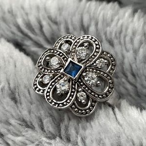 Sterling silver cocktail ring with blue and white stones